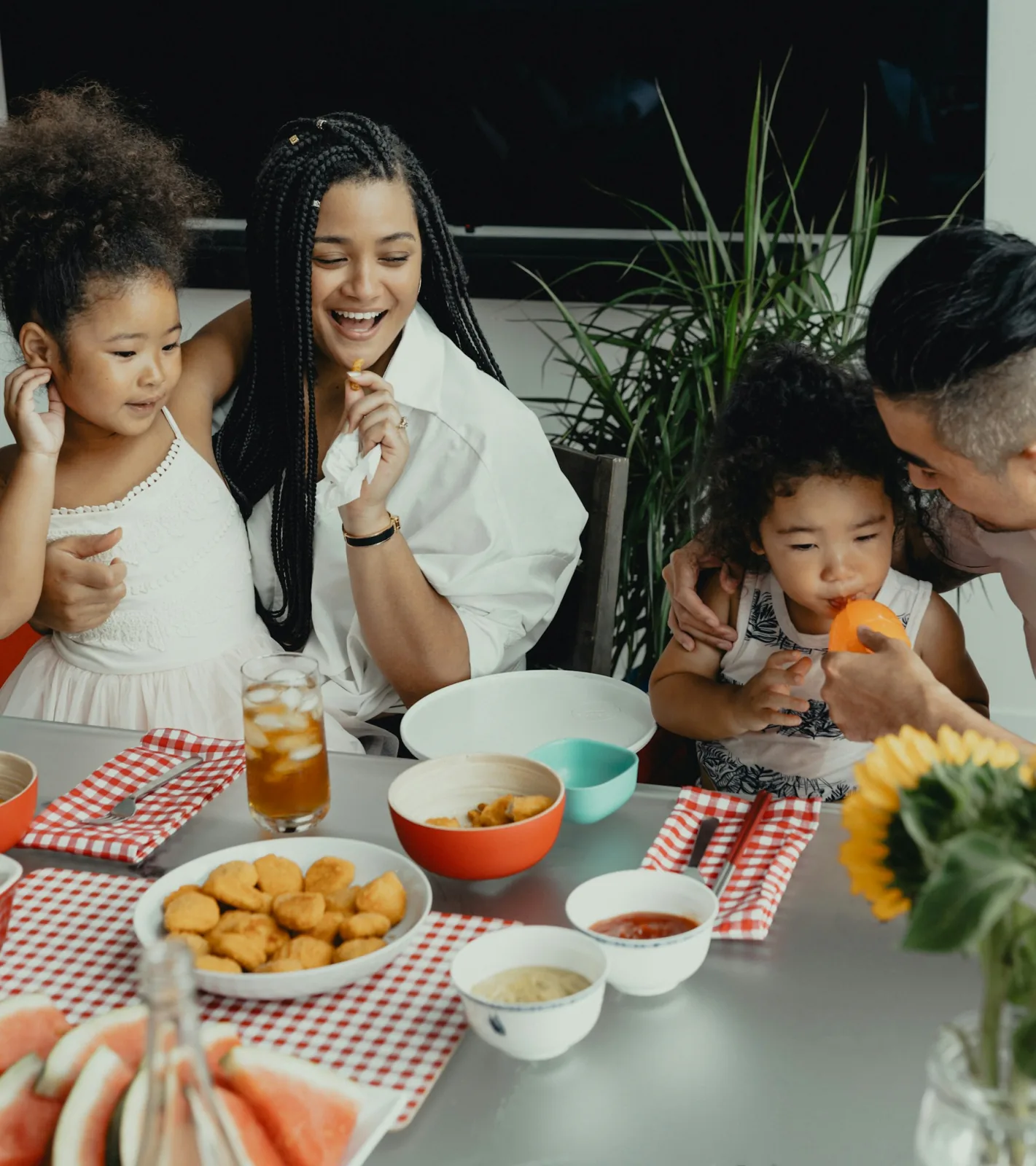 A family sharing dinner together at home