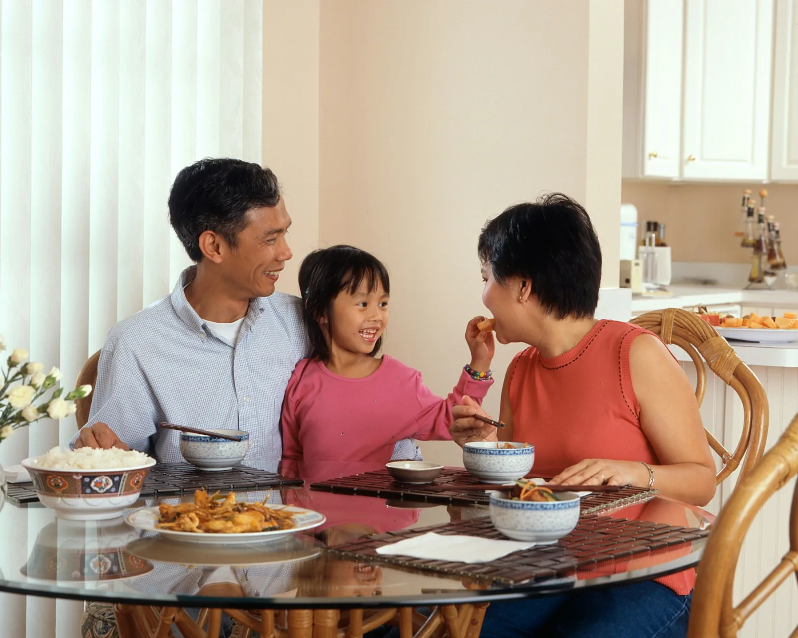 A family talking together over dinner