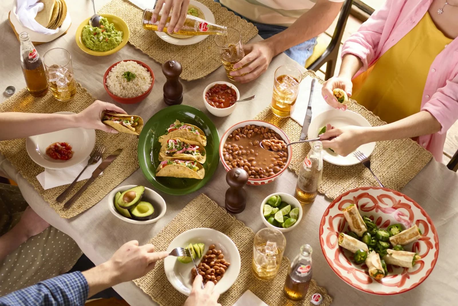 Friends sharing a colorful meal around a dinner table